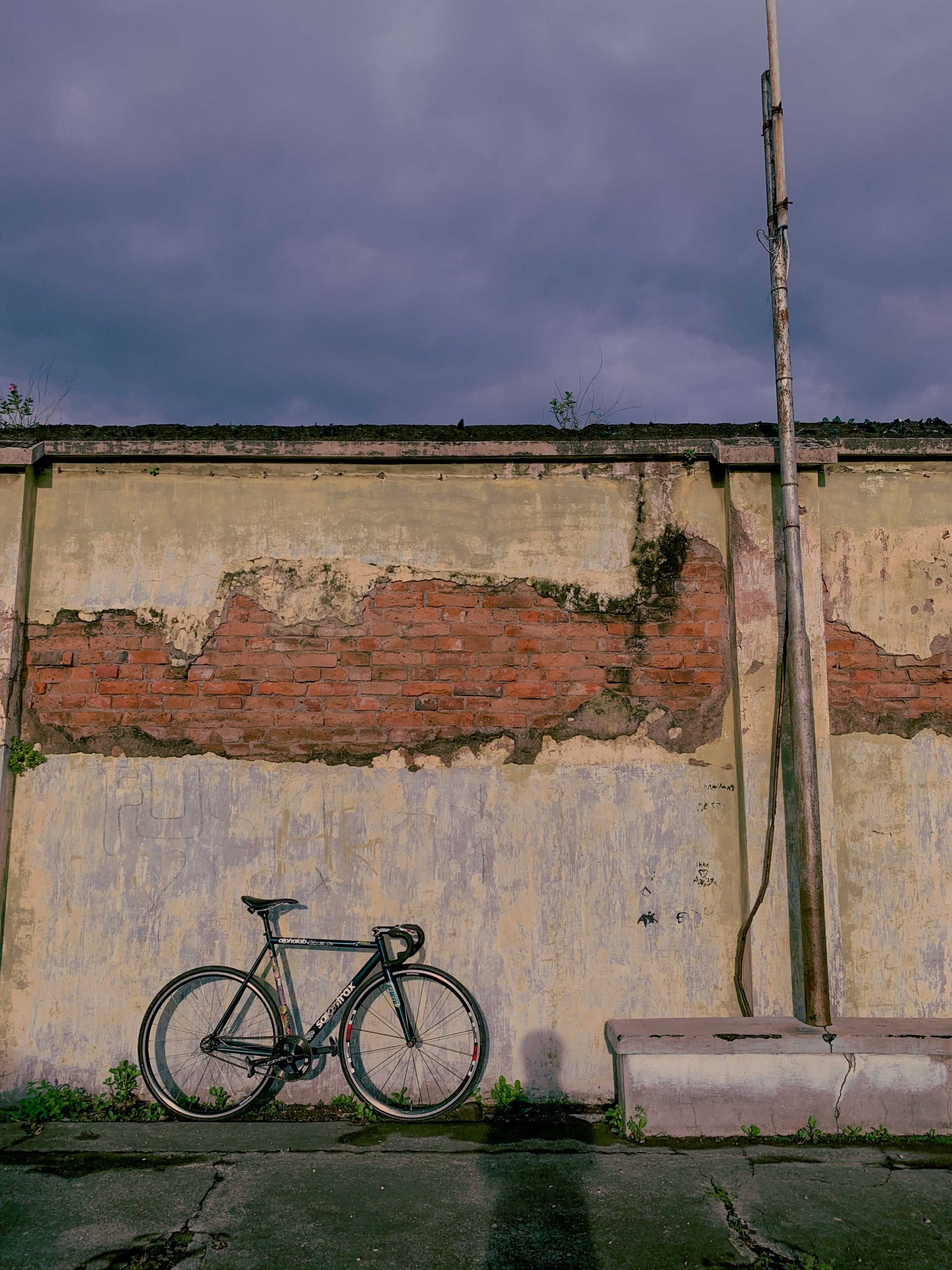 fixed gear bike on the wall at the downtown of yogyakarta city
